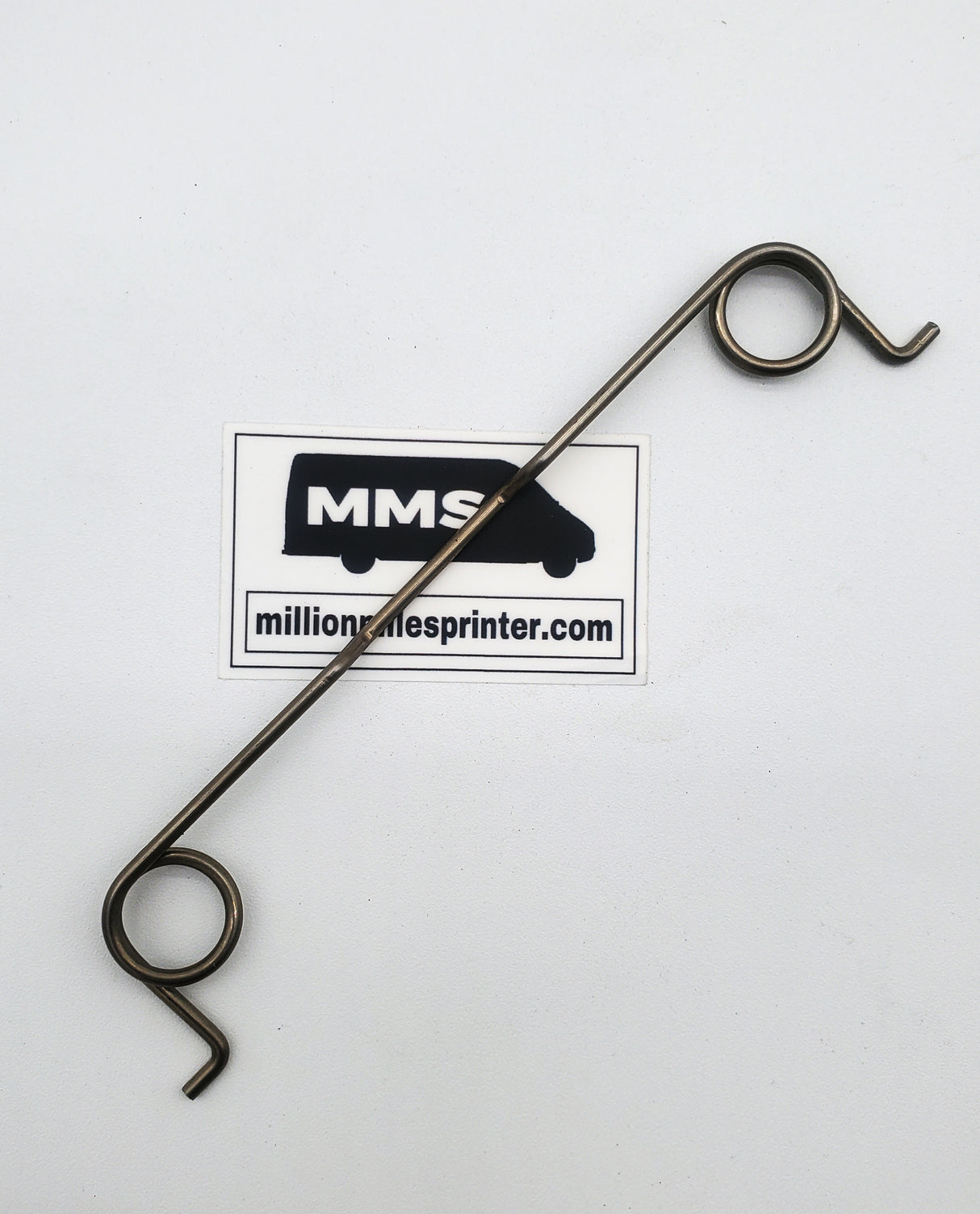 T1N Fuel Door Spring, New (2001-2006 Vans)